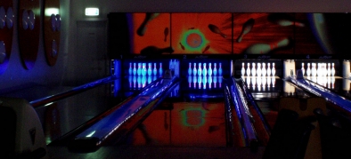 Photo - looking down toward lanes 1 and 2 the pins are lit with blue LED light
